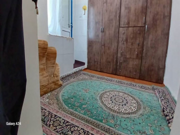 تصویر خانه ویلایی با ارتفاع و بالکن بزرگ و پارکينگ