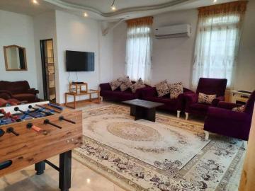 تصویر آپارتمان دو خواه همراه با تراس رو به دریا