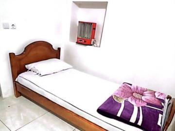 تصویر اتاق یک تخت در اوز - سیامک