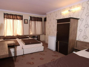 عکس مهمانپذیر ایده آل(اتاق سینگل)