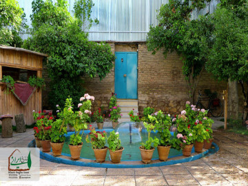 تصویر اقامتگاه"خانه باغ ایرانی"اتاق نیما یوشیج