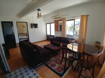 عکس واحد پنج تخته ساحلی با چشم انداز دریا