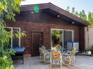 تصویر باغ ویلا با حیاط سرسبز واستخر سرپوشیده آب‌گرم