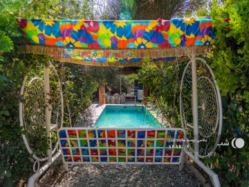 تصویر باغ ویلا با حیاط سرسبز واستخر سرپوشیده آب‌گرم