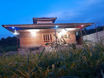 تصویر کلبه چوبی جنگلی ماهورا