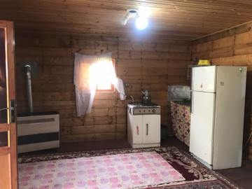 تصویر کلبه چوبی جنگلی ماهورا